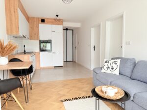 salon z aneksem kuchennym mieszkanie Verde Wieliczka Livio biuro nieruchomosci Krakow